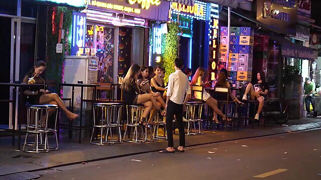 Sexy Saigon sluts show off petite frames in the streets