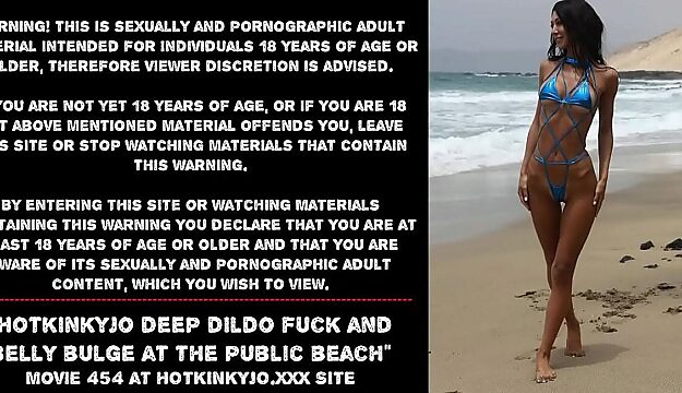 Public anal dildo bulge with Hotkinkyjo at the beach