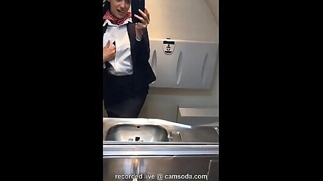 Latina Stewardess Masturbates in Plane Bathroom While Being Watched