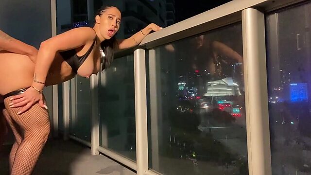 Busty Valerie Kay Gives a Sloppy Blowjob on Balcony