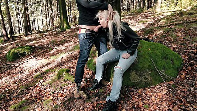Hot babe sucks big cock outdoors in leather jacket and jeans