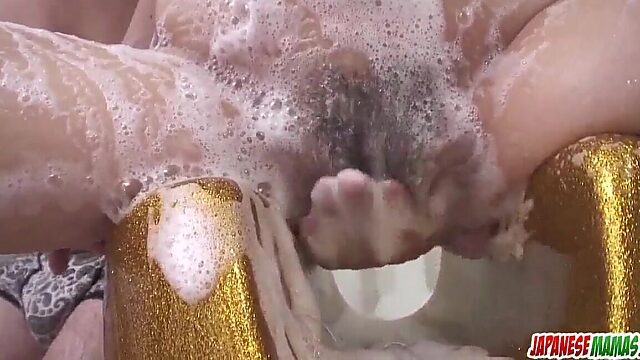 Steamy Asian blowjob in the soapy bath with Miina Kanno