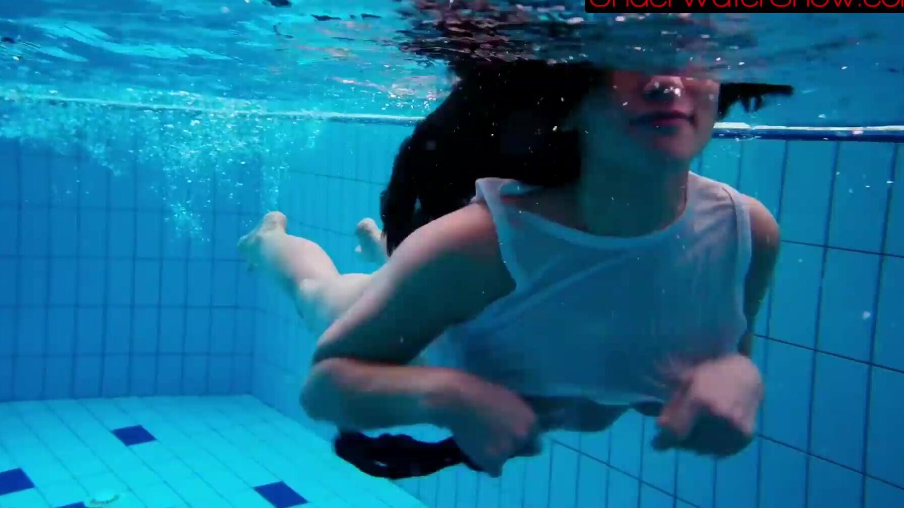 Bald & Beautiful Nympho Dives into Pool - XXXshake.com Video